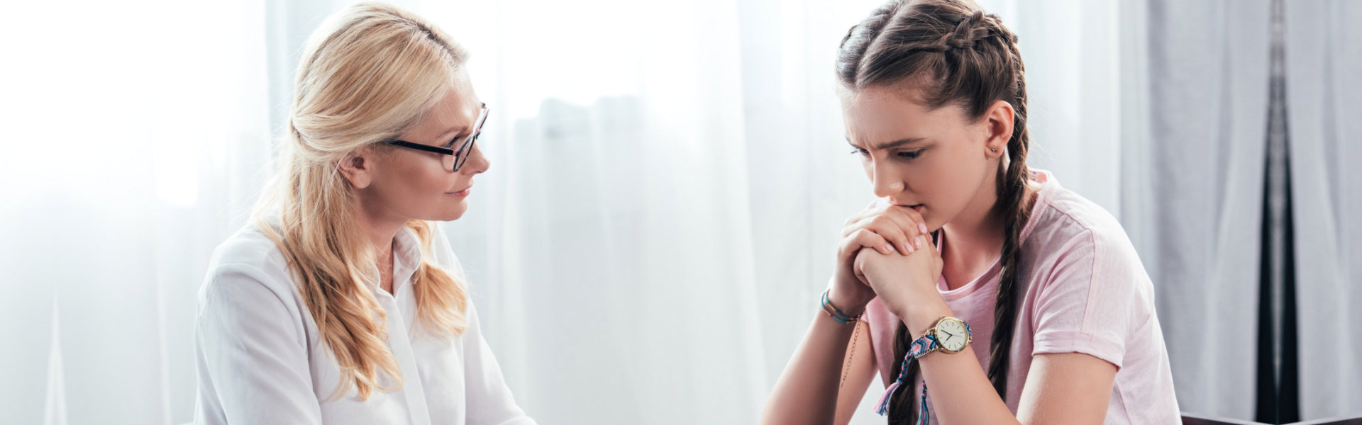 Therapist talking to her client